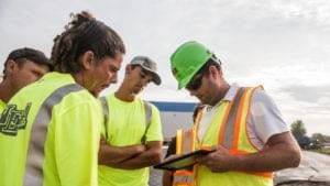 Construction workers working together