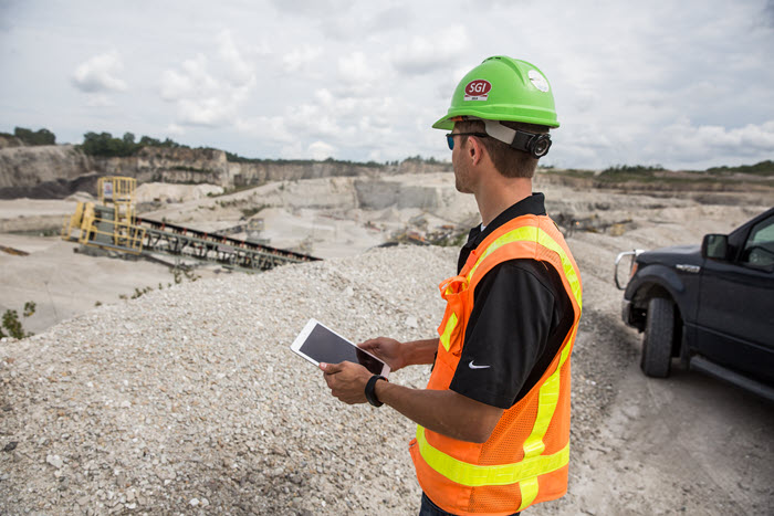 construction project manager on tablet