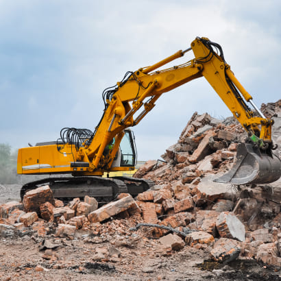Construction equipment demolishing