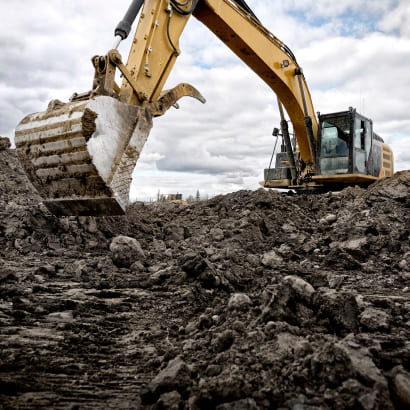 Construction equipment moving dirt