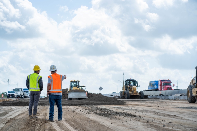 Construction workers on a Webber jobsite adhering to safety protocols to maintain a low Total Recordable Incident Rate (TRIR).